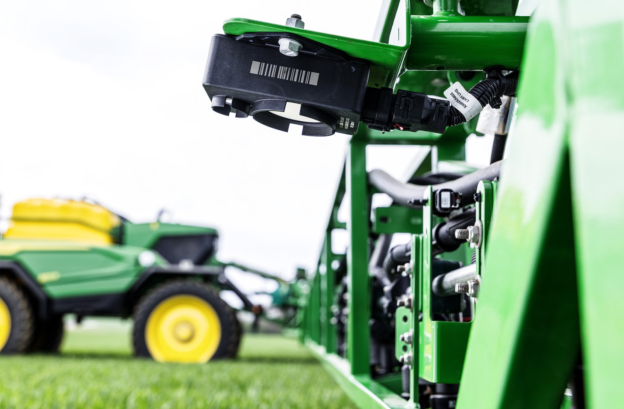 Close-up van een BoomTrac™ 2-sensor op de 500R-spuitboom